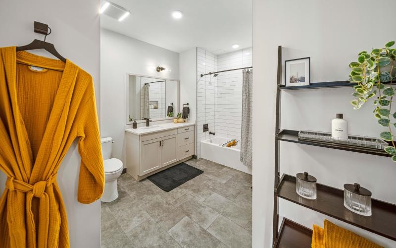 a bathroom with a shower and toilet