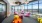 a room with colorful chairs and a large window
