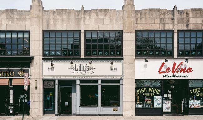 The essence of exceptional living a building with a sign on the front